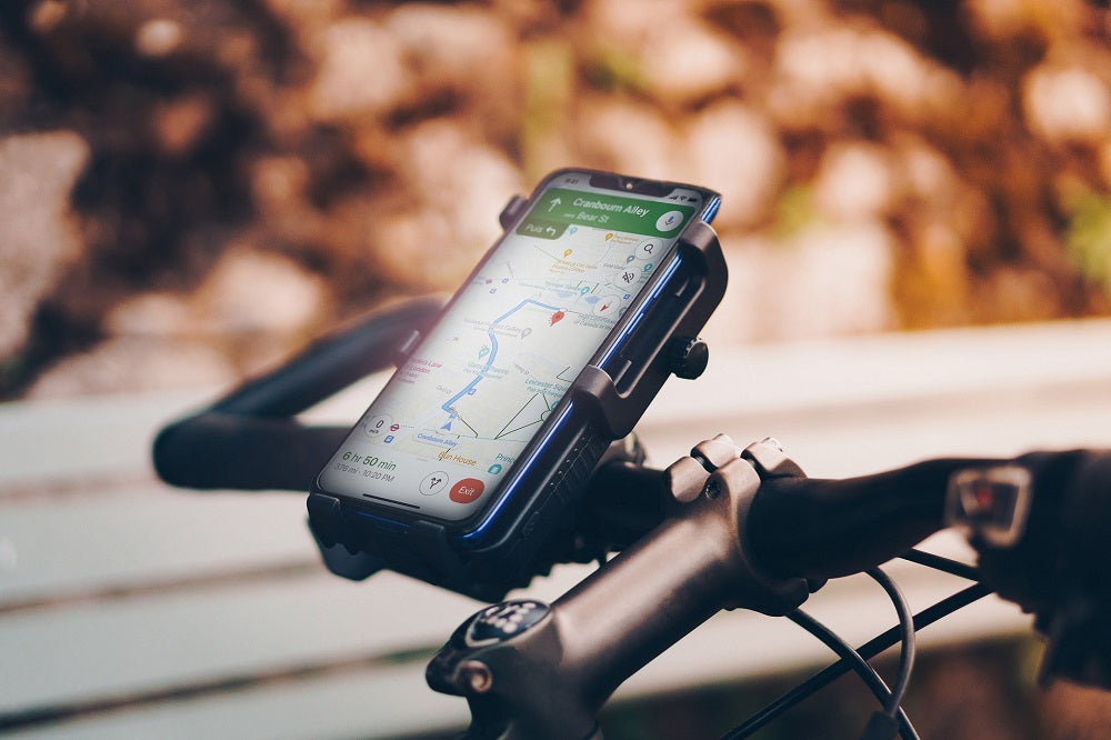 cyclotron motorcycle phone charger with activated GPS attached to handlebars