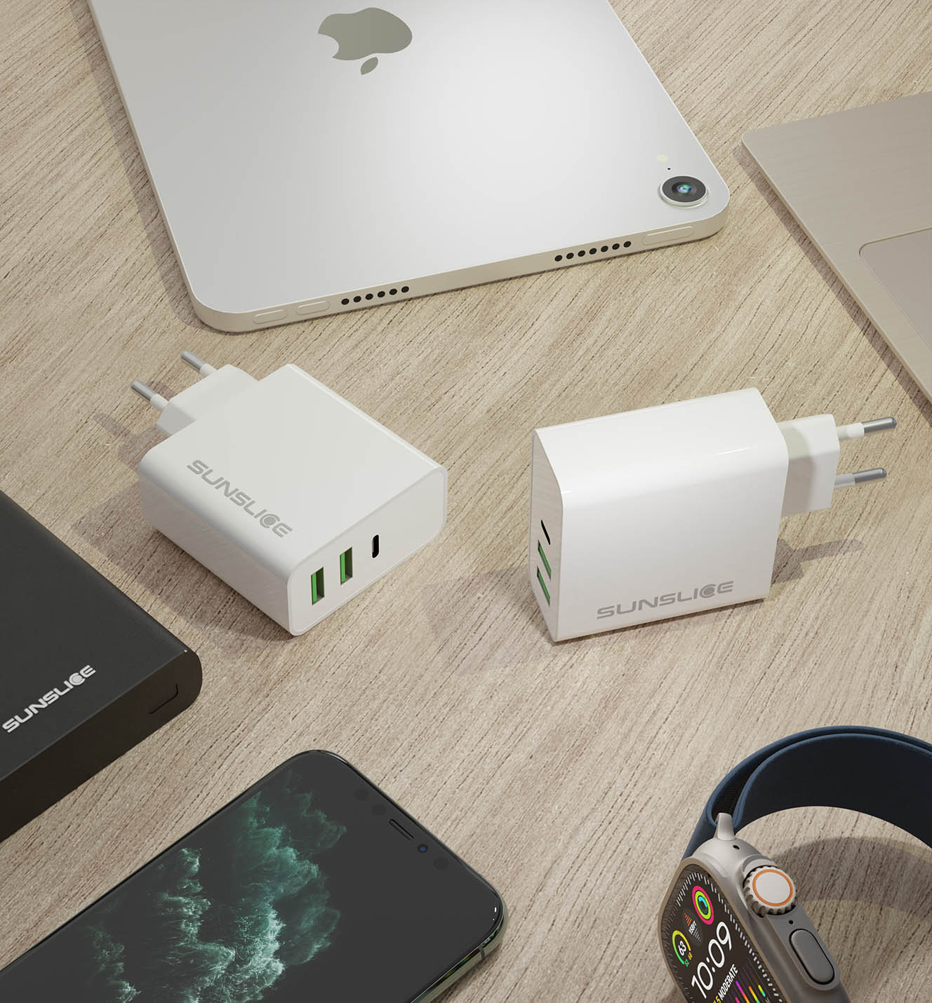 laptop usb-c charger Emperion surround by a tablet, a laptop, a Sunslice powerbank and a phone